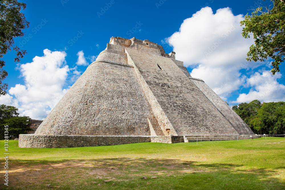 Magician (Piramide del adivino) in ancient Mayan city Uxmal, Mex Magician (Piramide del adivino) in ancient Mayan city Uxmal, Mex