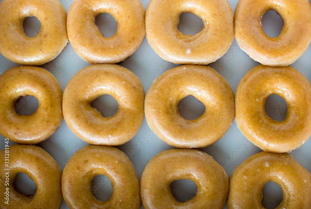 Many donuts in a row.