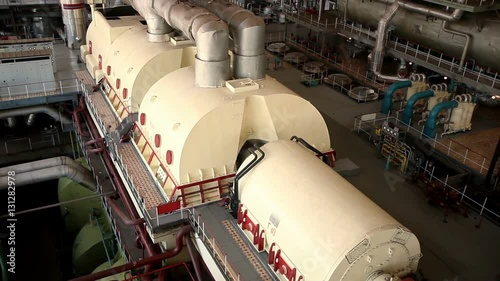 A turbine generator in the engine room of a nuclear power plant. HD
