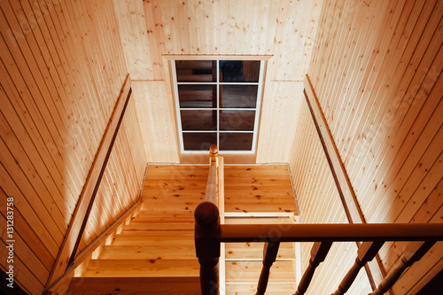 Fototapeta staircase and handrails inside of wooden house