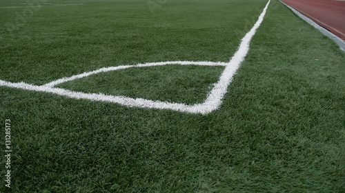 football Soccer field corner with green artificial sport grass