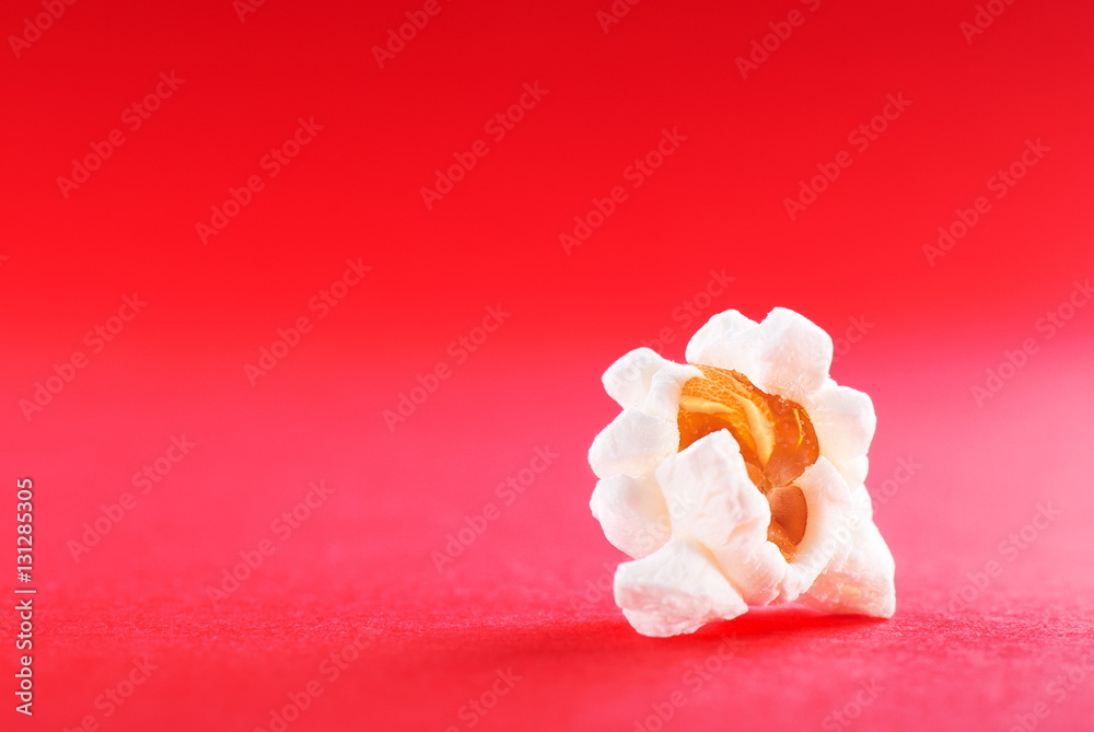 popcorn close-up on a red background popcorn close-up on a red background
