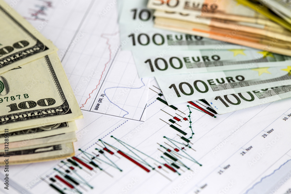 Concept of currency trading. .Hundred us dollar bills . Piles of euro bills. Currency us euro exchange chart under the bills. 200 euro bills, 100 euro fan shaped. Close up image.
Concept of currency trading. .Hundred us dollar bills . Piles of euro bills. Currency us euro exchange chart under the bills. 200 euro bills, 100 euro fan shaped. Close up image.