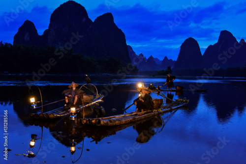 Photos Fisherman of Guilin, Li River and Karst mountains during the blue hour of dawn,G