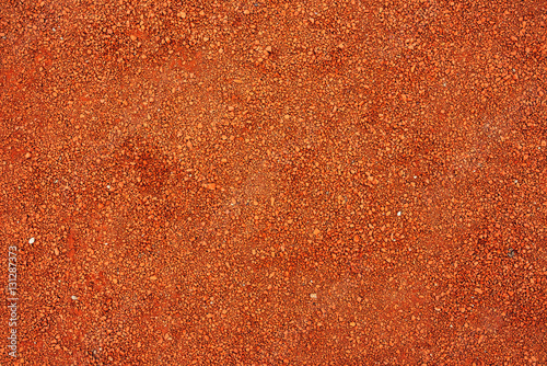 Dry light red crushed bricks surface