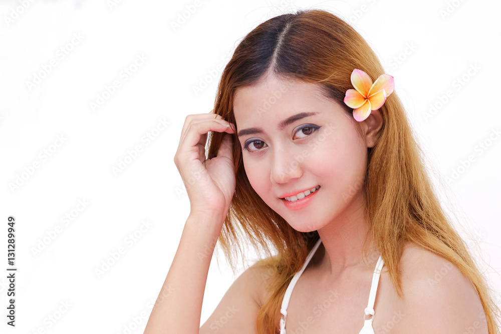 Beautiful Asian long hair female with flower on white background Beautiful Asian long hair female with flower on white background