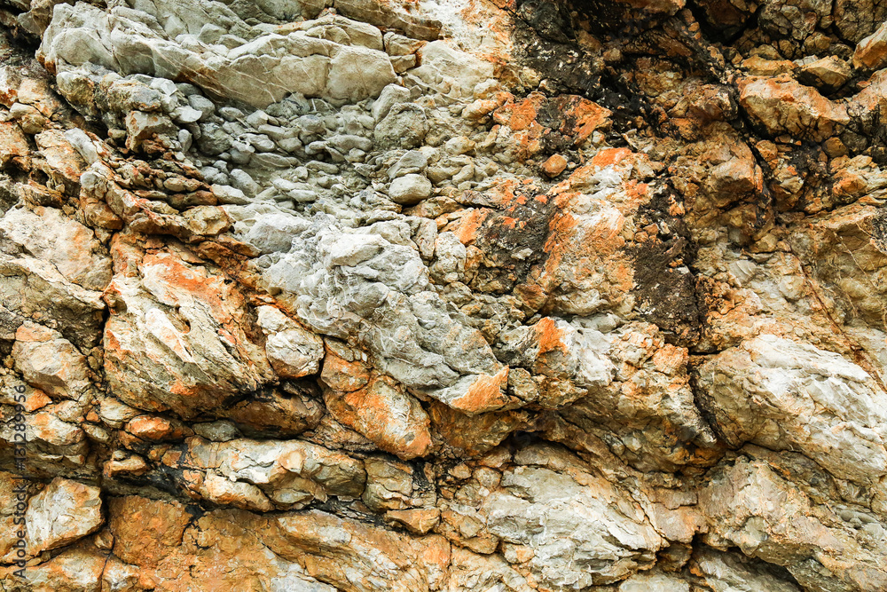 Rocks surface, cliffs texture, pile of stones. Closeup natural background.