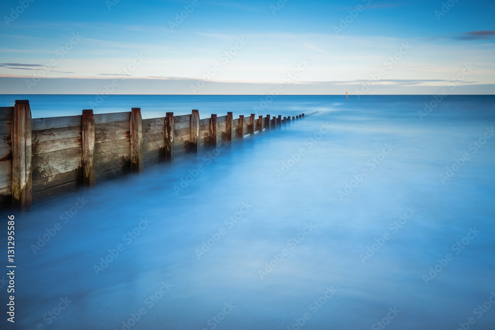 Long Exposure of Blyth Beach Groyne, in Northumberland, making it minimalistic, as it enters the North Sea