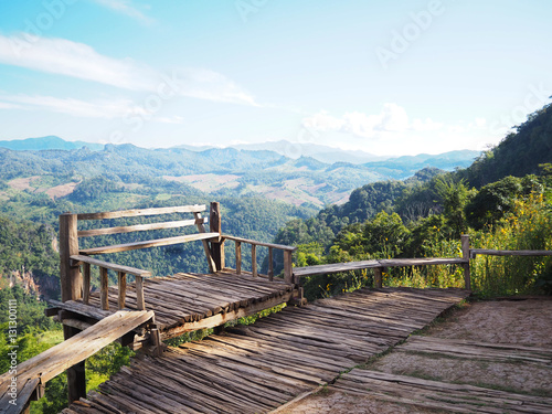 Fototapeta Naklejka Na Ścianę i Meble -  Wooden seat at viewpoint in Mae Hong Sorn province, Northern of Thailand