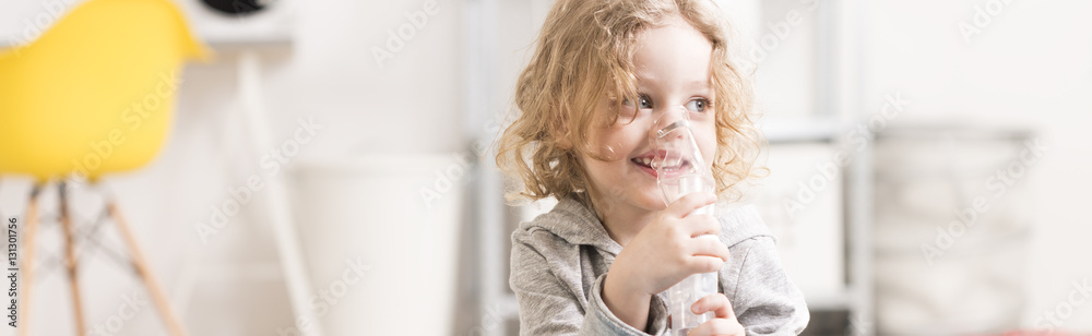 Happy little boy using inhaler - obrazy, fototapety, plakaty 