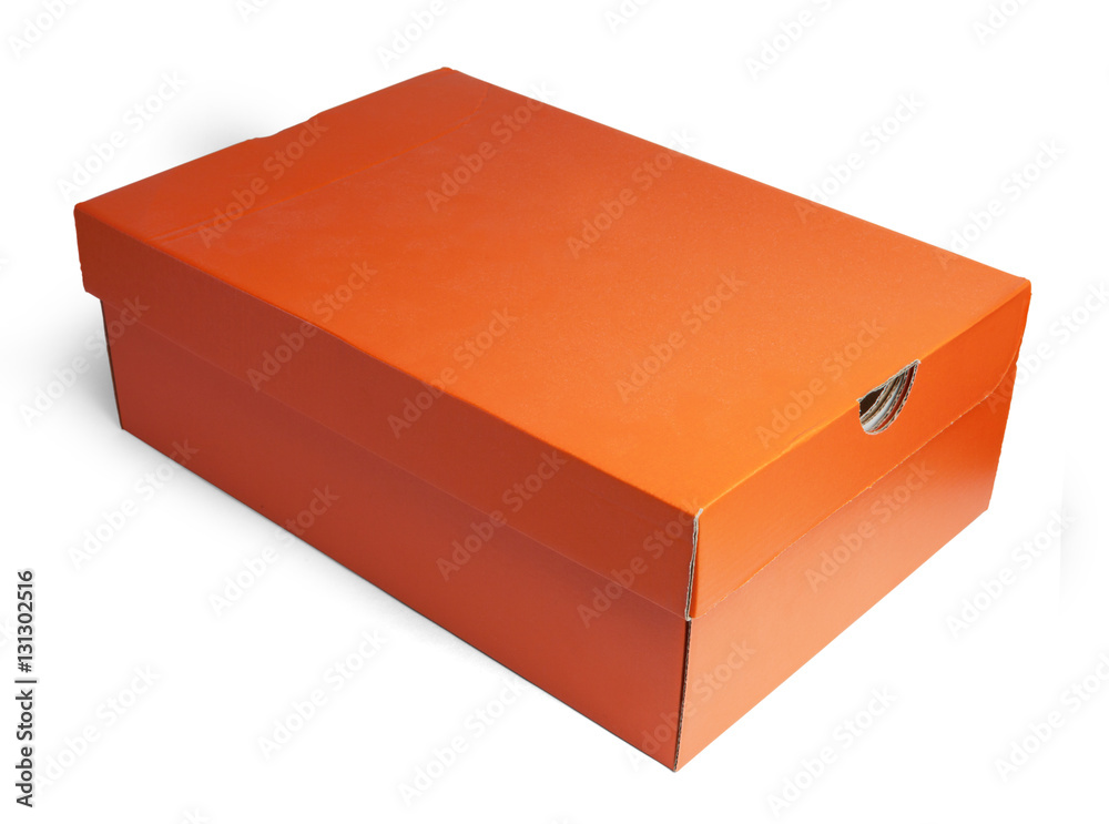 Closed cardboard box, full face. Orange and brown paper box isolated on white background with clipping path.