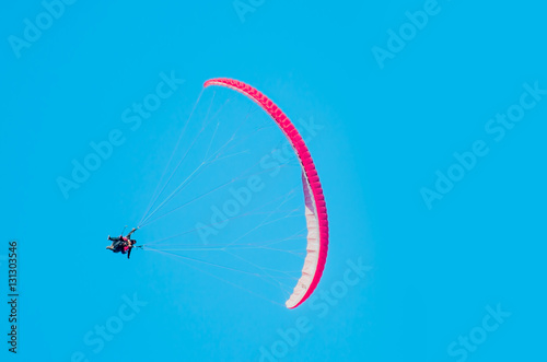 Paraglider doing acrobatic tricks over babadag mountains