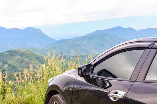 Closeup car over the mountain background, travel concept with copy space © bookybuggy