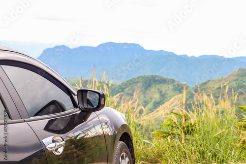 Closeup car over the mountain background, travel concept with copy space © bookybuggy