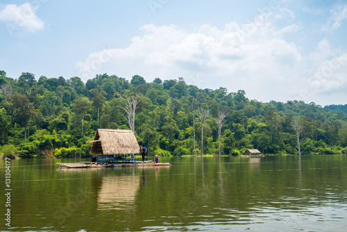 Bamboo raft, floating house in lake