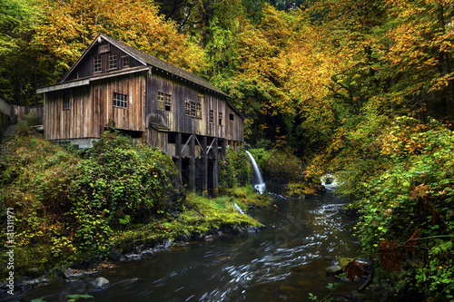 Cedar Creek Grist Mill with fall color. Located in Woodlands, Washington. photo
