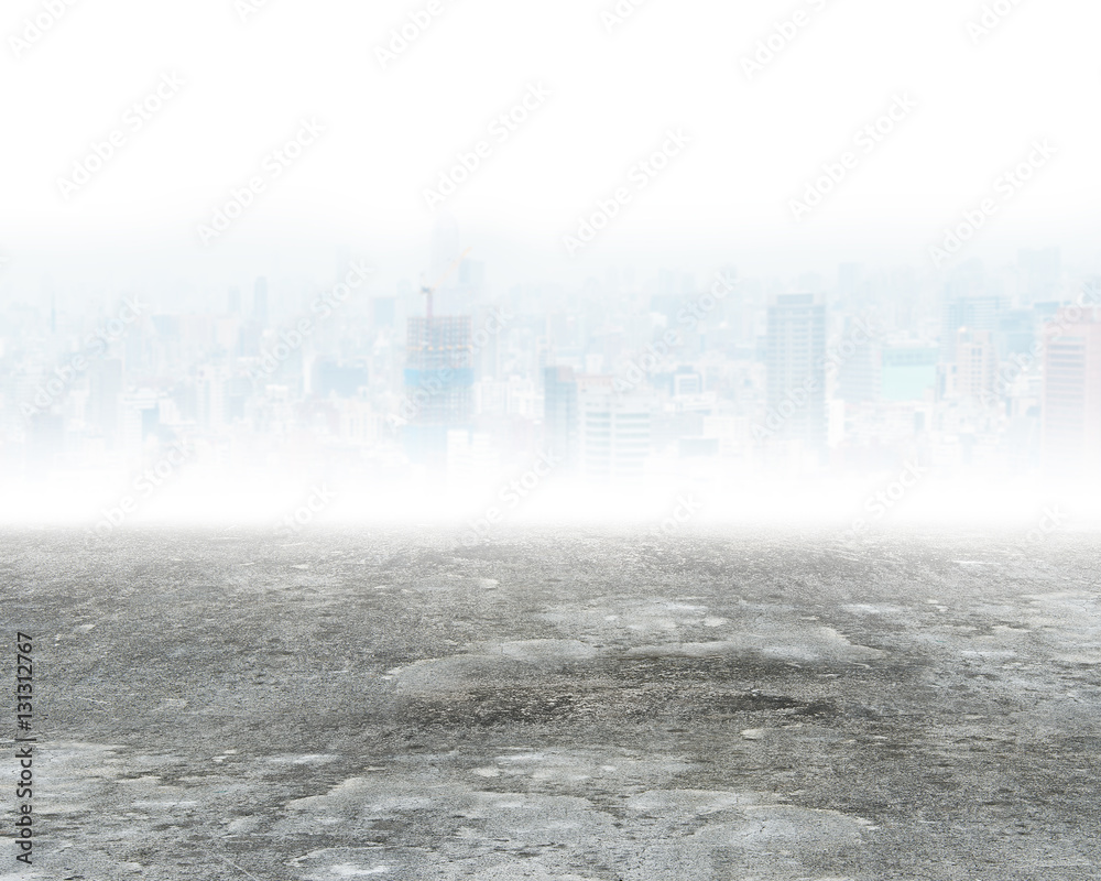 Concrete floor and city background with mist