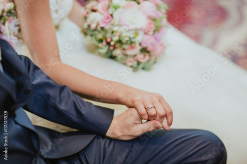 hands during wedding ceremony