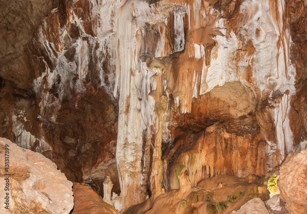 Underground cave with stalactites and stalagmites.