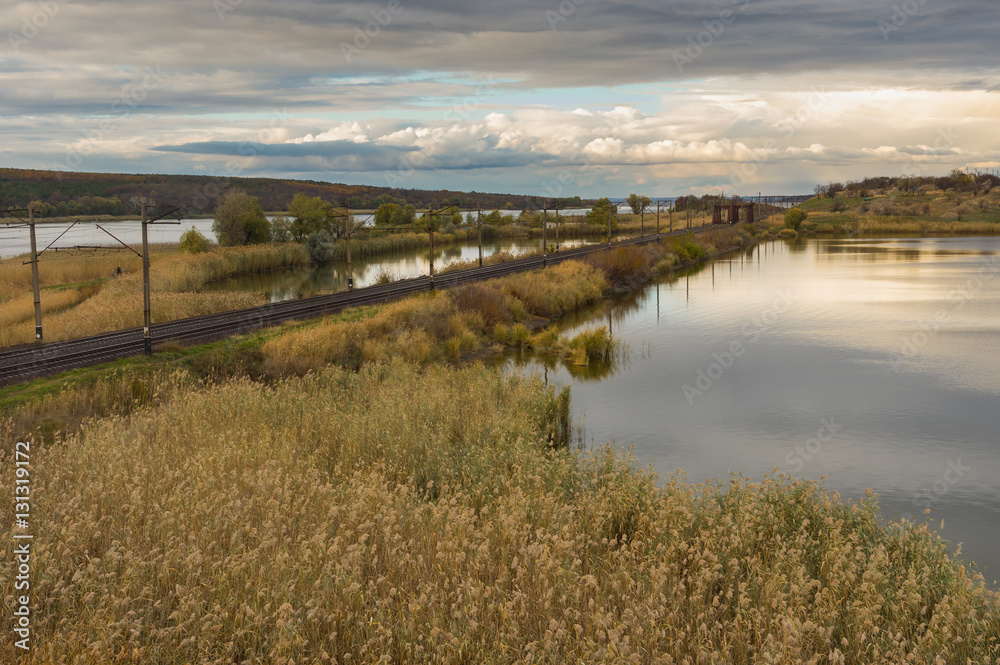 Autumnal landscape with place where small river Karachokrak flows into Dnepr, Ukraine Autumnal landscape with place where small river Karachokrak flows into Dnepr, Ukraine