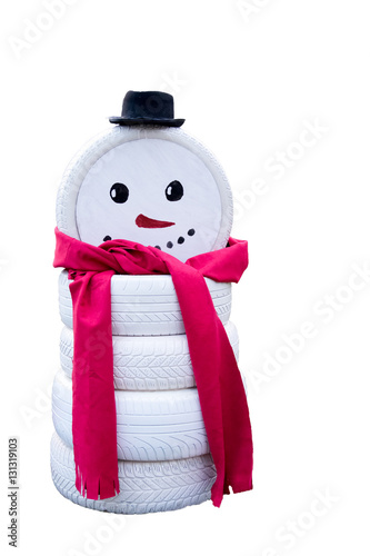 Snowman made from painted tires isolated on white background.