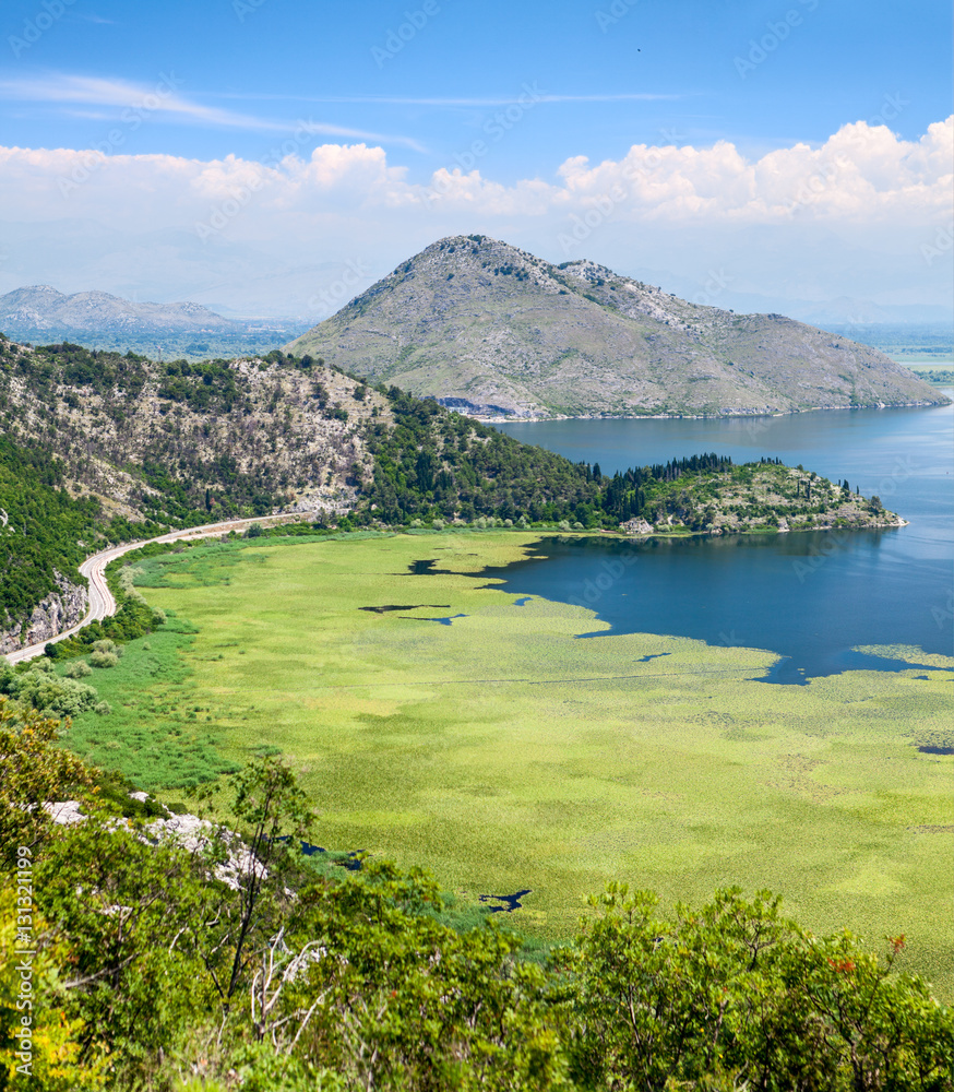 Panorama of the Montenegrin part of Skadar lake with highway around. Skadarsko jezero is a national park in Montenegro, Europe