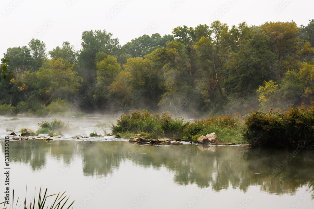 View of a misty river in Lodosa, Spain View of a misty river in Lodosa, Spain