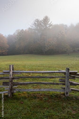 Section of Split Rail Fence and Foggy Field