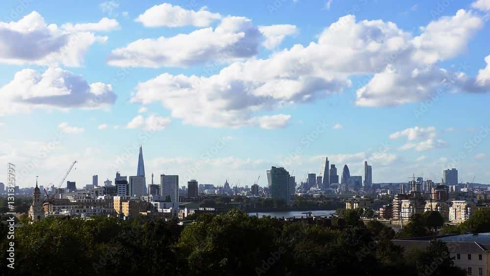 Time lapse. White clouds float over central London. Time lapse. White clouds float over central London.