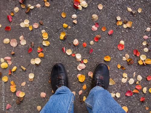 Feet on the asphalt.