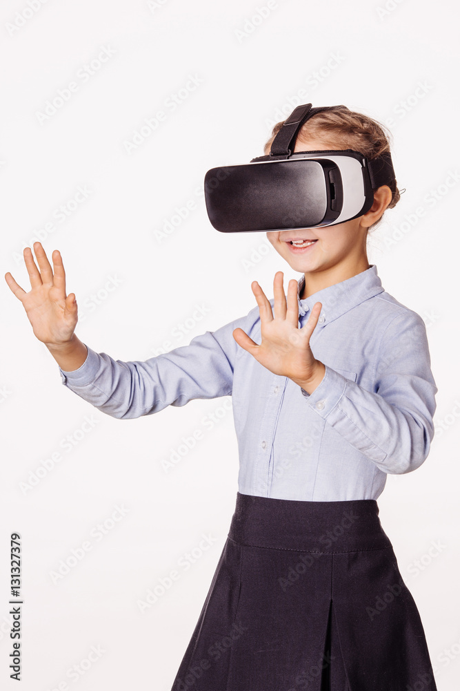schoolgirl with virtual reality headset. Innovation technology schoolgirl with virtual reality headset. Innovation technology
