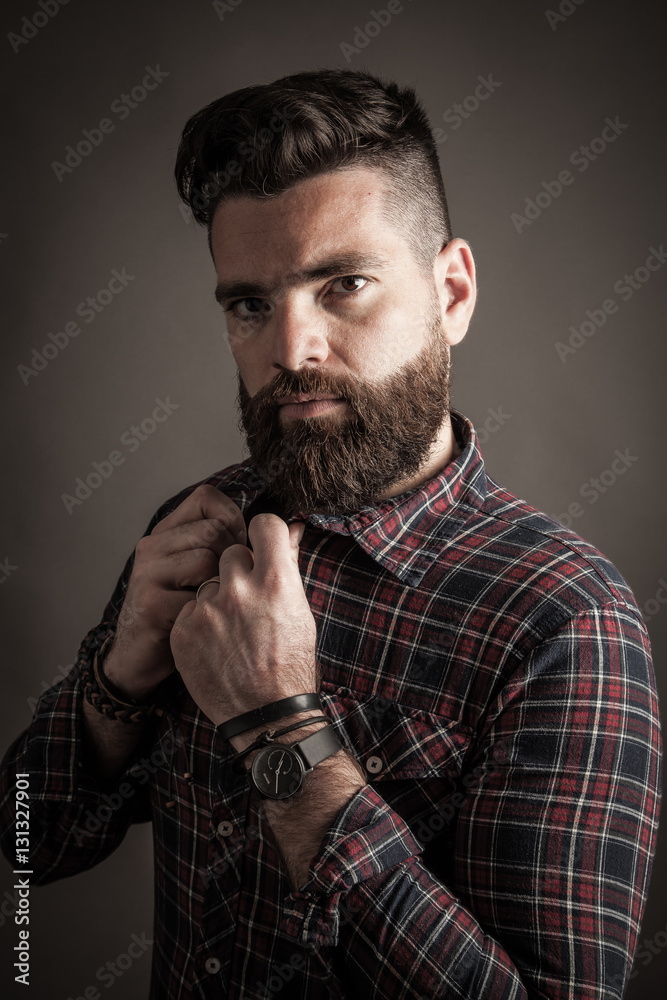 Young handsome hipster with beard Young handsome hipster with beard