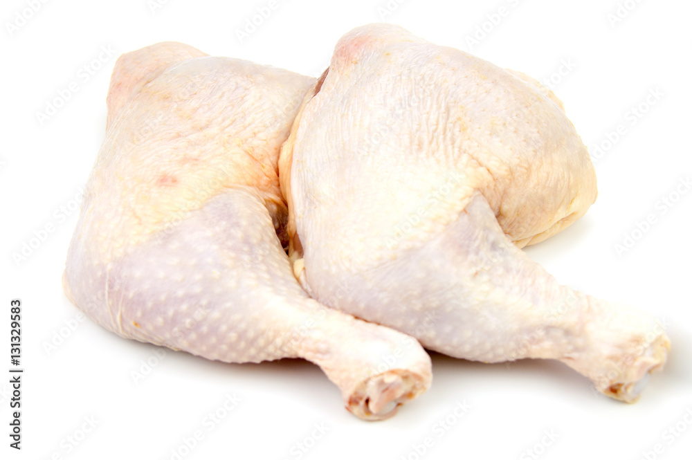 Raw chicken  drumsticks isolated on white.