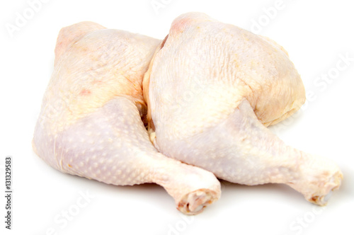 Raw chicken  drumsticks isolated on white.