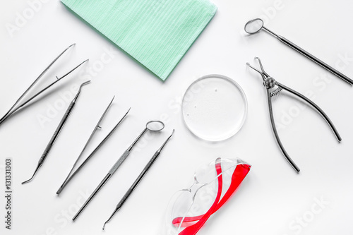 dentists tools in cabinet on white desktop top view