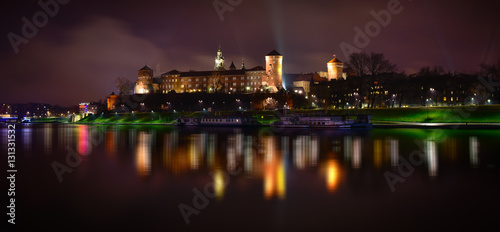 Panoramic night view of Wawel castle in Cracow. Poland