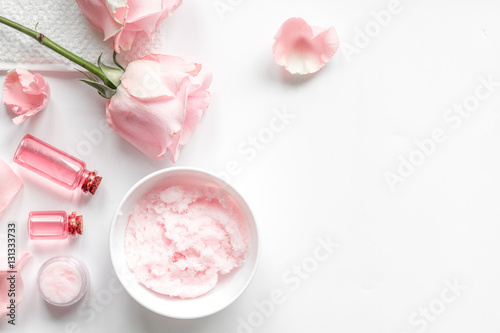 organic cosmetic with rose oil on white background top view