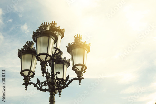 Photography Detail of street lamp in Barcelona city on a sunny day