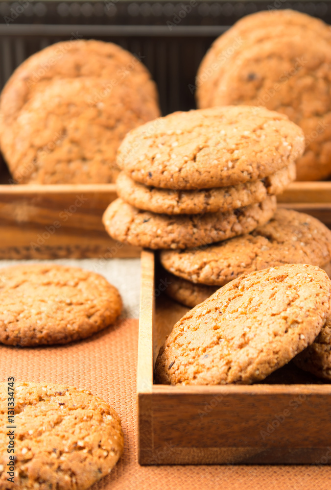 Group of oatmeal cookies on the wooden tray Group of oatmeal cookies on the wooden tray