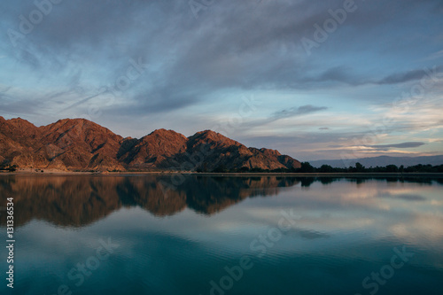 Sunrise at California lake and mountains