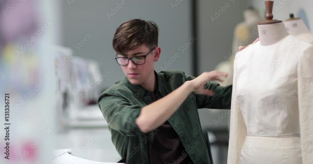 Fashion student designing a garment Fashion student designing a garment