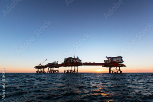 Silhouette of an offshore oil installation  © Lukasz Z