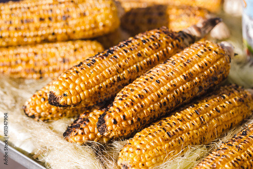 Hot and flavorful grilled corn close up. Asian street food