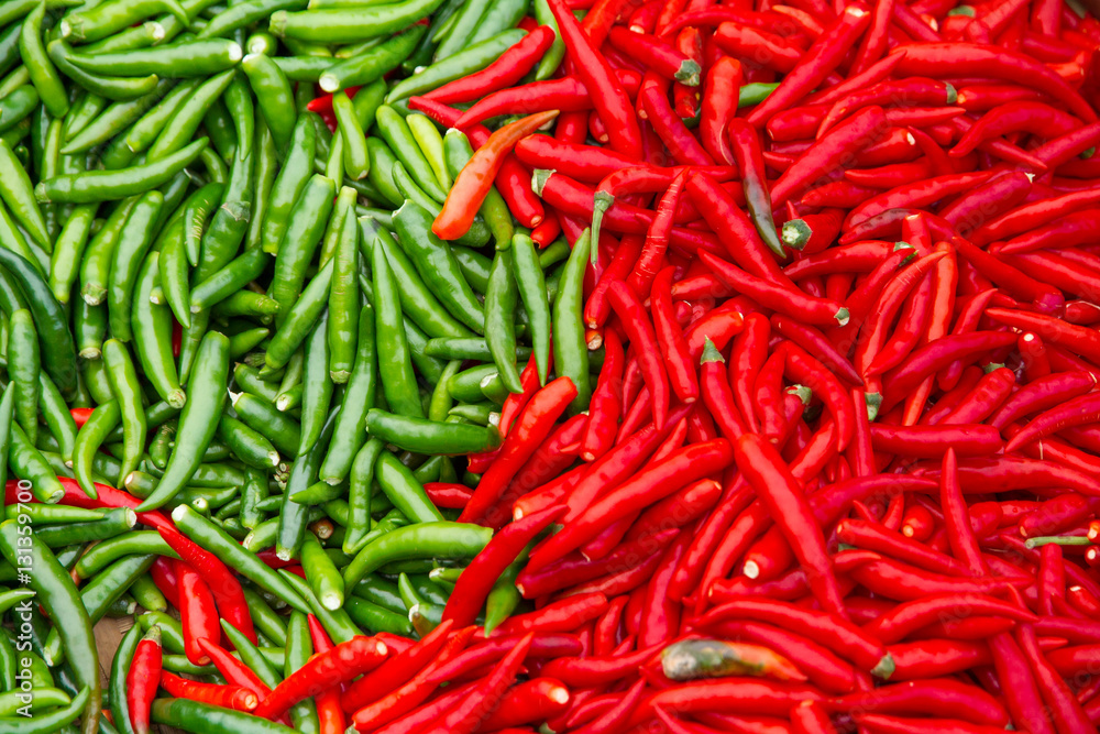 Red and green chili for cooking in the market. Red and green chili for cooking in the market.