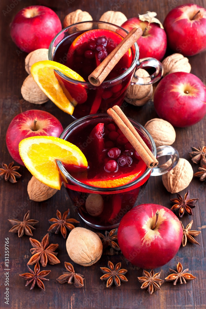 Glass with mulled wine and spices Glass with mulled wine and spices