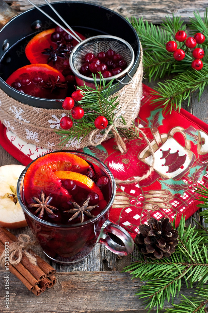 Old metal pan with tasty mulled wine on rustic wooden table Old metal pan with tasty mulled wine on rustic wooden table