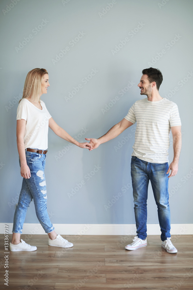 Full length of couple holding hands Full length of couple holding hands
