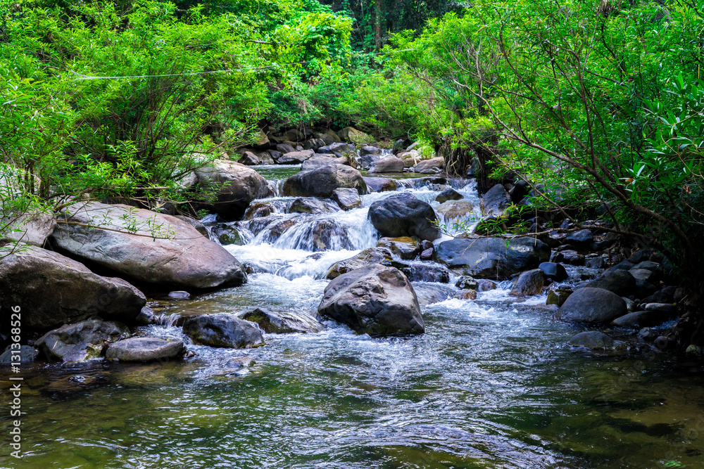 waterfall in green forest in at Nan , Thailand waterfall in green forest in at Nan , Thailand