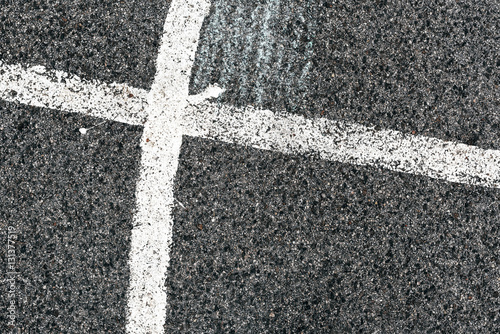 White line and asphalt road as simple urban background pattern