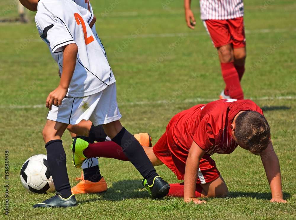 Young children are playing soccer Young children are playing soccer